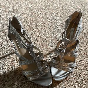 Used heels very cute silver With rhinestones zip heel